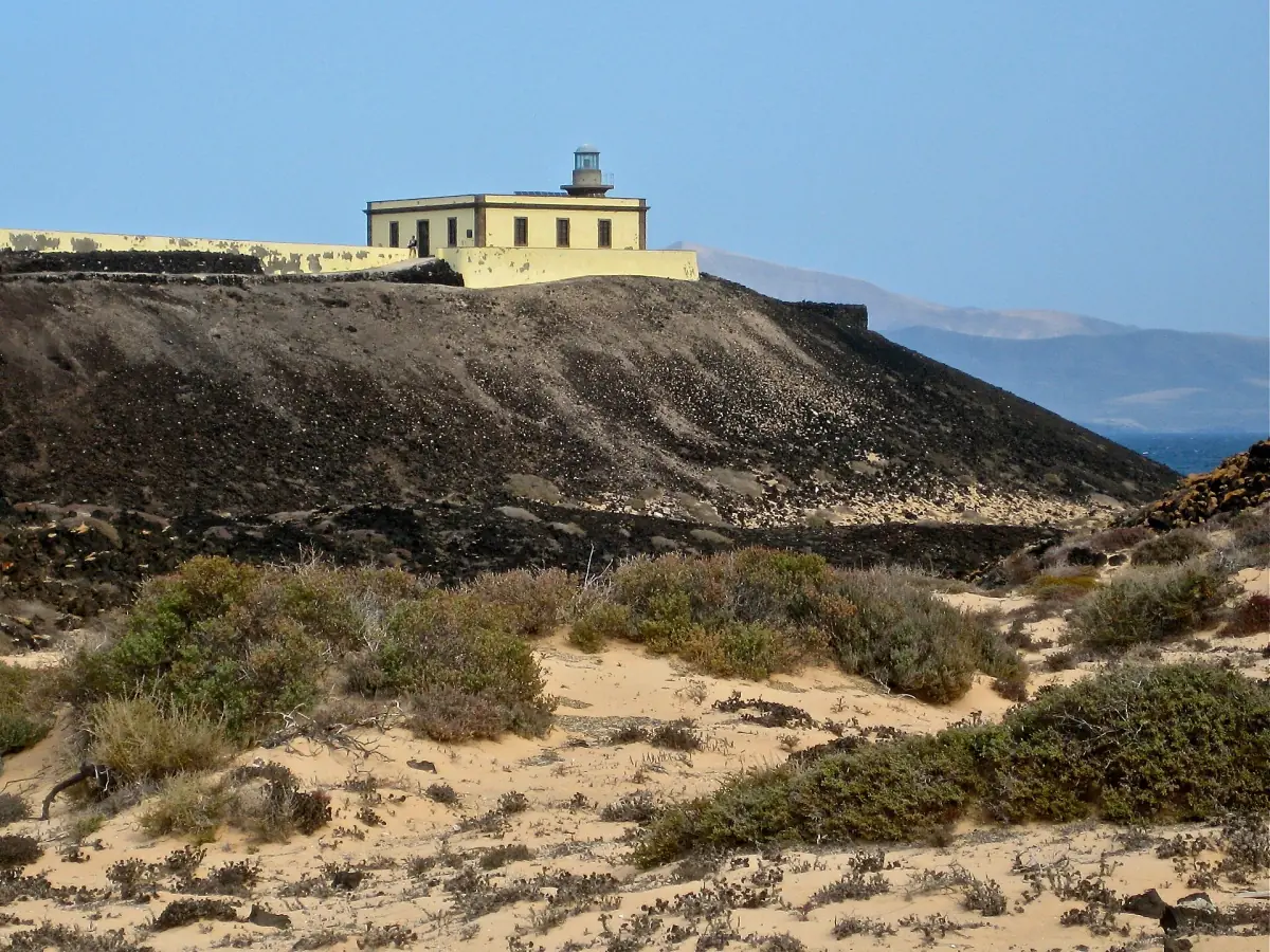 The lighthouse on a cliff on Isla de Lobos